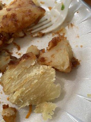 Top portion of the BBQ chicken baked potato.