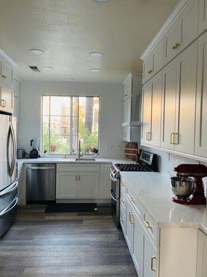 My kitchen. I love my double stacked cabinets.