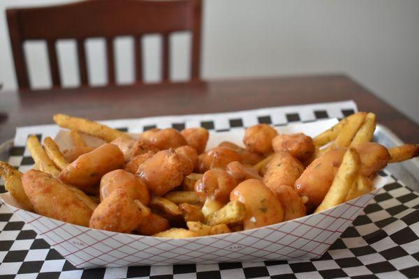 Poutine! Cheese Curds, French Fries and Gravy. Yum!