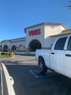 Outside of the Vons. It's located between T Mobile on the right and the cleaners and Sally Beauty on the left.