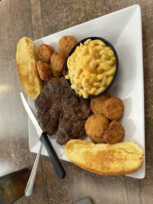 Hamburger steak (16 oz) with fried squash and Mac & cheese!!!!! Sooooo good!