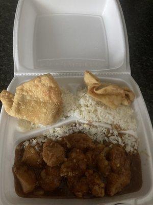 Hot and spicy chicken with white rice and crab Rangoon