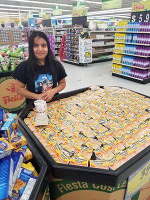 This young girl couldn't stand the soups not in order. While her mother was in line she decided to do something about it.