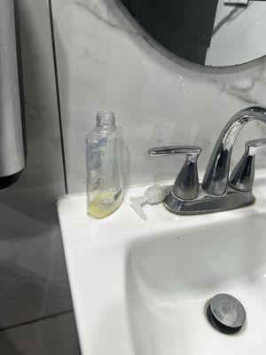 No soap at all, multiple empty soap bottles thrown on the floor..