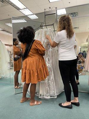 Trying to pick out that monumental dress.