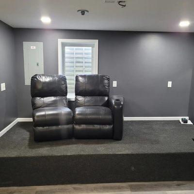 Basement remodel with a theater.