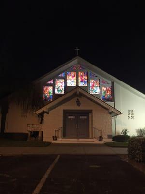 The stain-glass windows at night