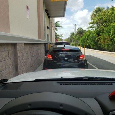 line for drive thru Covid Testing and prescriptions