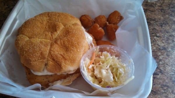 The most delicious fish sandwiches I have ever had!  This is a 1/2, coleslaw, and corn nuggets. The corn nuggets are wonderful!