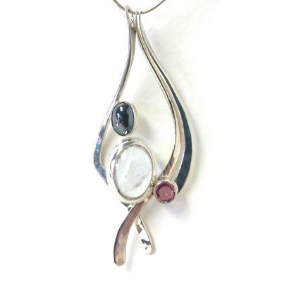 A new concept in Mother's jewelry, each of these sterling pendants has 1 stone, and nest together...