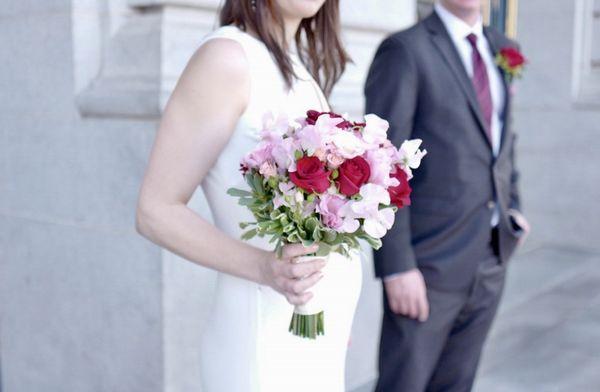 Wedding couple with baby on the way