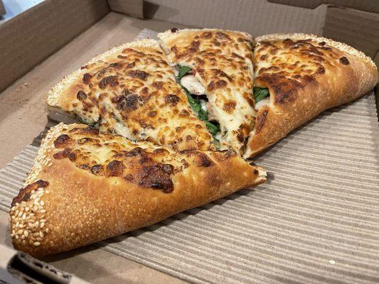 Calzone with fresh tomato, mushroom and spinach