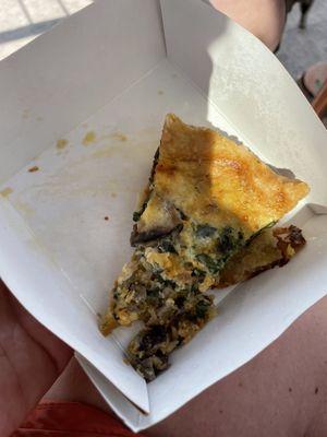 Mushroom quiche. Delicious but it was a sad little piece.