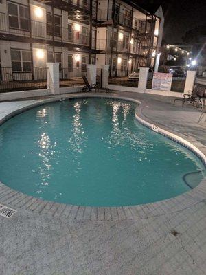 Same condominium, a few hours later, no longer green and sanitized.  The residents have been using their pool ever since!