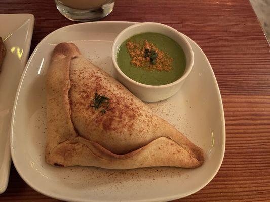 Baked tempeh empanada with aji verde