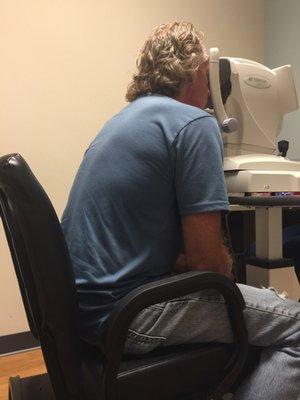 Hubby getting his eyes checked!