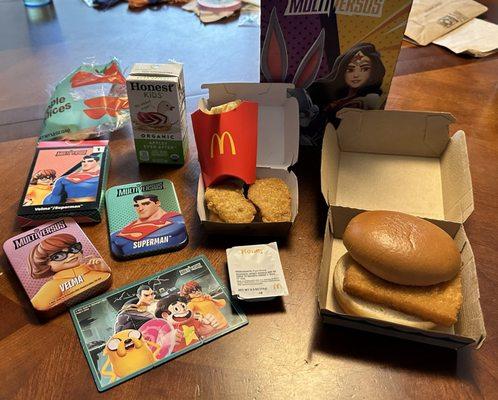 Chicken nuggets Happy Meal with Multiverse tin/puzzle and a filet-o-fish sandwich.