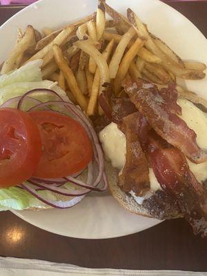 Bacon Cheese Burger with a side of fries.