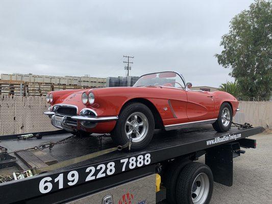 We love towing classic beauties like this red vette!