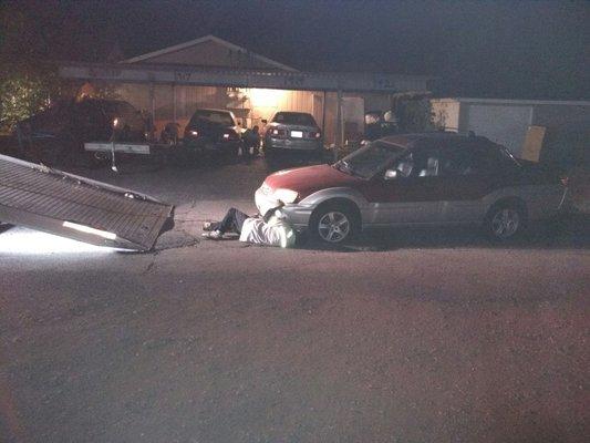 Loading up my Subaru with four flat tires after being stolen by meth heads.