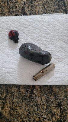 Rock, battery, magnet