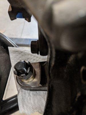 Caliper bolt will not seat because it was never machined.