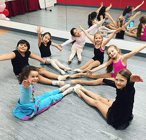 Our Mini Ballerinas started their warm-up stretch all by themselves! The teacher and assistant were so impressed they had to snap a picture!