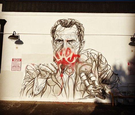 7/28/20 Downtown Whittier, CA. Caught my eye while driving. Intended representation? Def vandalized. Def Nixon.