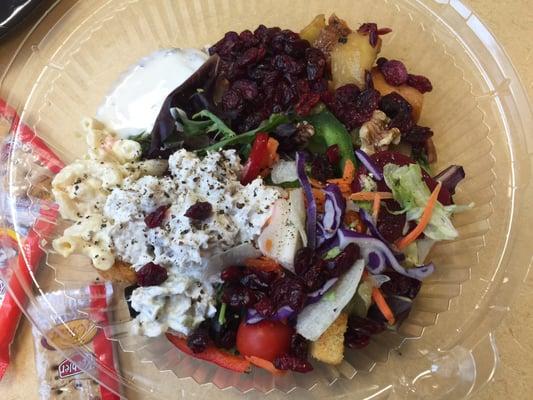 Salad, grilled fruit top right next to cranberries.