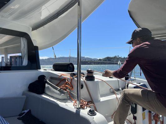 Captain getting sails ready.