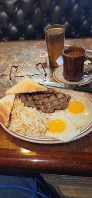 1/30/24 skirt Steak and eggs sunny side up white toast hash browns light cawfee