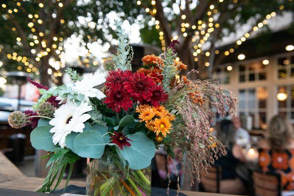 Stunning floral arrangement by Stems Floral for a special dinner at Mäksē Restaurant.