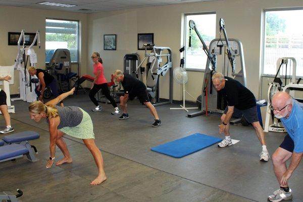 Mary teaching a group strength and flexibility class!