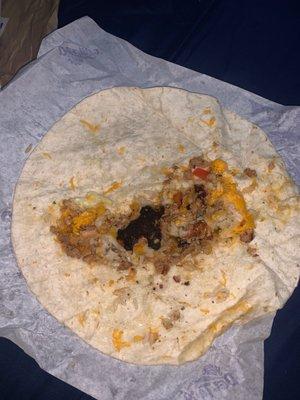 what the actual fuck is this i almost ate this burnt chicken this is absolutely revolting the Spicy Grilled Chicken Burrito