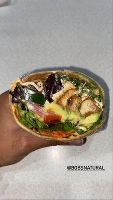 Vegan Grilled tofu wrap: tofu, avocado, tomato, lettuce, carrots, cucumber with smoke chipotle sauce