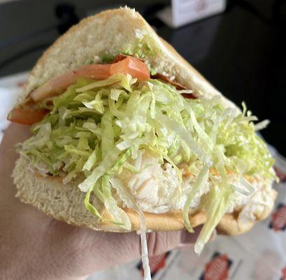 Turkey-Bacon-Avocado + Cheddar with lettuce, tomato, and mayo on a sub roll