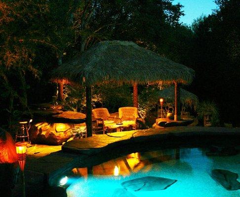 Palapas, Tiki torches, and Fiber optic Lighting in pool really set that Caribbean vibe you have been searching for!