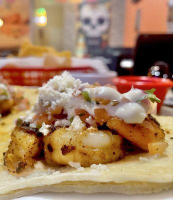 Shrimp Tacos! - cooked perfectly topped with cotija cheese & crema on double corn tortillas :)...