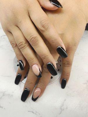 Black Gel nails with accented French tip ring finger