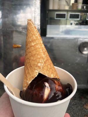 Blackberry cheesecake ice cream with Ghirardelli chocolate sauce and a homemade cone!