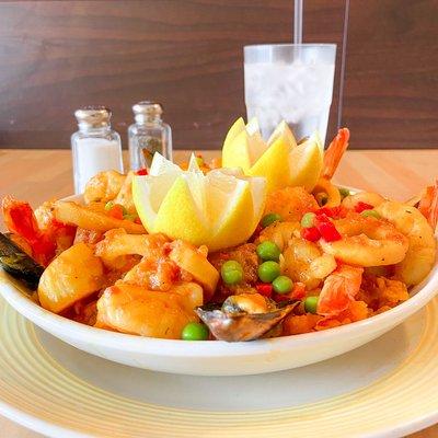 Mixed seafood Valenciana, server on bed of saffron rice 
Goes well with our fresh sangria! 

*please allow 30 mins to prepare