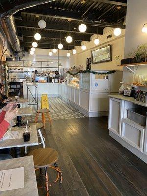 Inside the cafe! Really cute homey-industrial decor ! A nice mix and mash of materials.