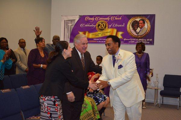 Assemblyman Jim Costa and his assistant greeting Pastor McGensy at his pastor appreciation ceremony