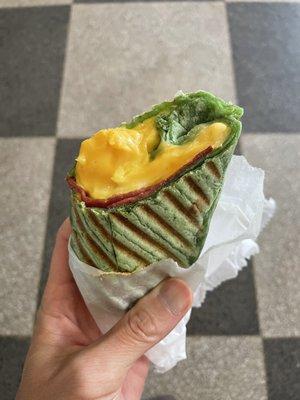 $4.75 "California" Breakfast Sandwich, but with spinach wrap. Eggs turkey bacon cheese avocado