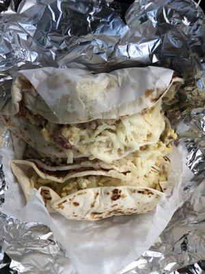 Three different breakfast tacos, all excellent