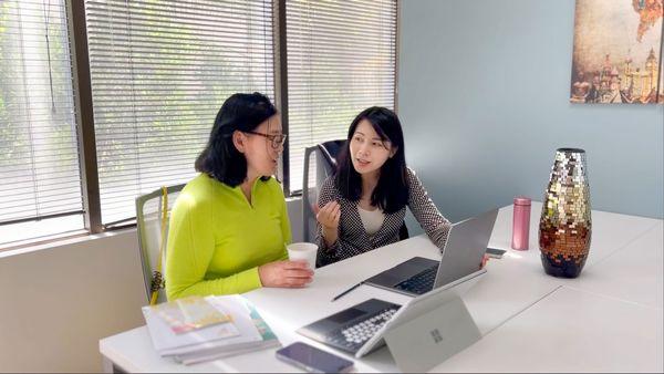 The teacher at Jade Chinese School was training an adult in the tones of Mandarin Chinese during the class.