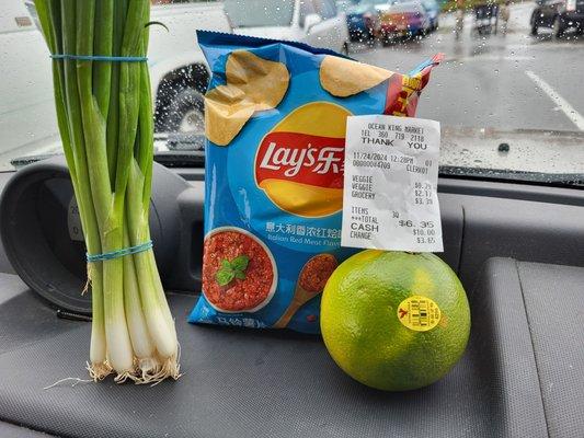 Fresh produce including this cute little grapefruit, small bag of chips were $3.39