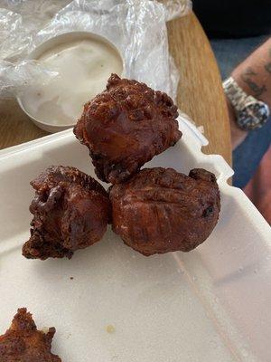 Burnt gross clam cakes