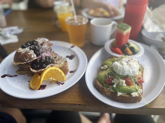 Avocado toast and blueberry stuffed French toast.