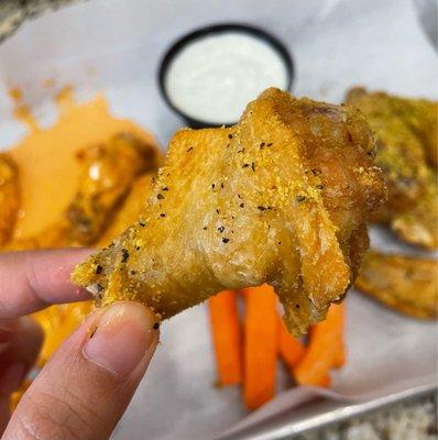 Hot wings with lemon pepper sauce